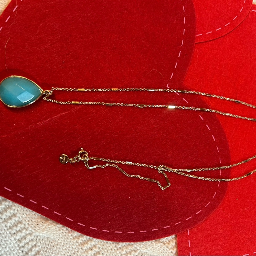 Elegant Gold Necklace with Blue Pendant